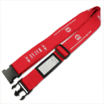 Red suitcase identity straps with name tag